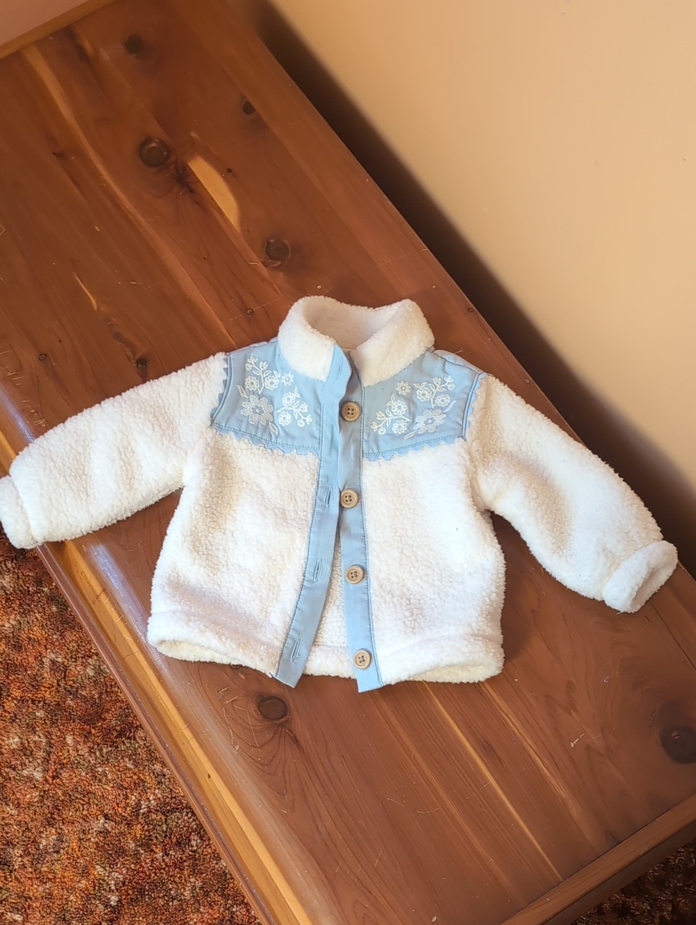 White Fleece Jacket with Light Blue Floral Trim 6-12 M